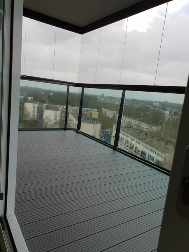 Balkon beglazing en vlonder